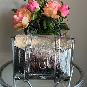 Michael Kors Metallic SilverTop Handel Bag With Cross Body Strap.